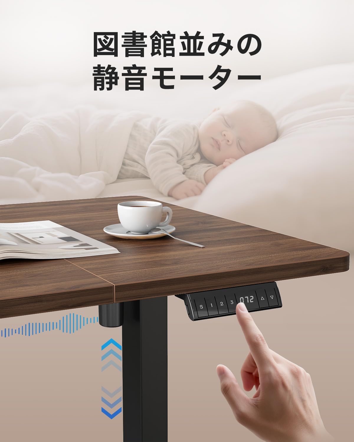 A hand pressing the control panel of a FEZIBO standing desk, with a baby sleeping peacefully in the background, illustrating the quiet motor operation.