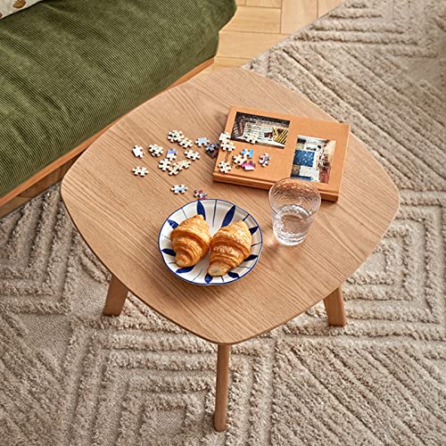 Petite table basse ronde en bois massif avec pieds robustes