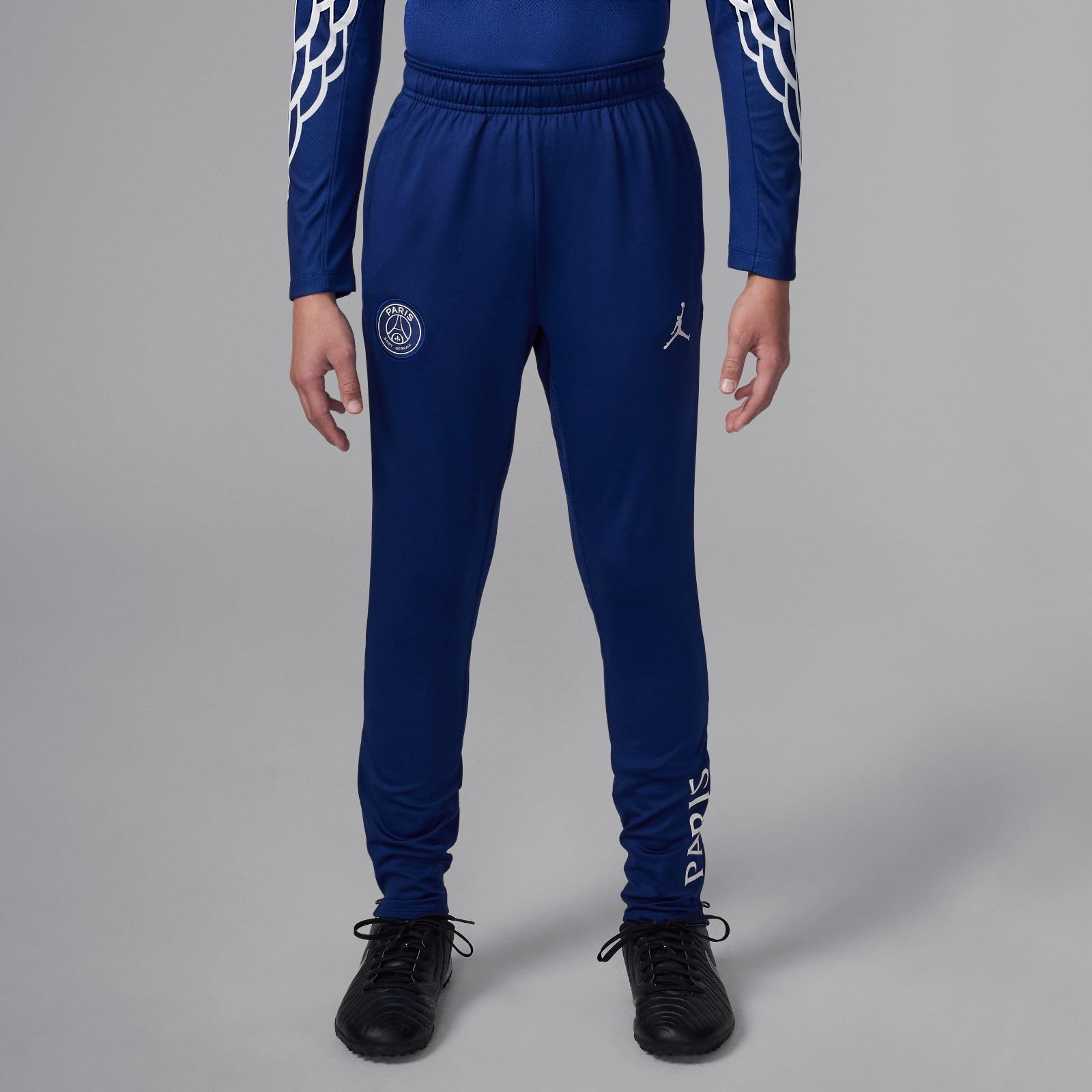Nike Paris Saint-Germain 2024/25 Fourth Jordan Dri-Fit spodnie z dzianiny dla dużych dzieci, Blue Void/Phantom, HJ3653-492, L
