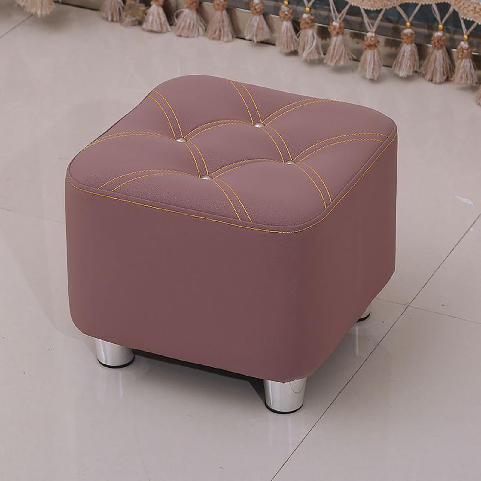 Banc ottoman rembourré à boutons pour soulager vos jambes