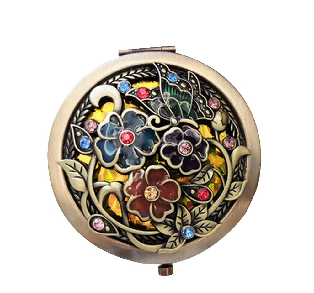 Miroir de poche rond vintage ODYO glissé dans votre sac à main pour vos retouches maquillage