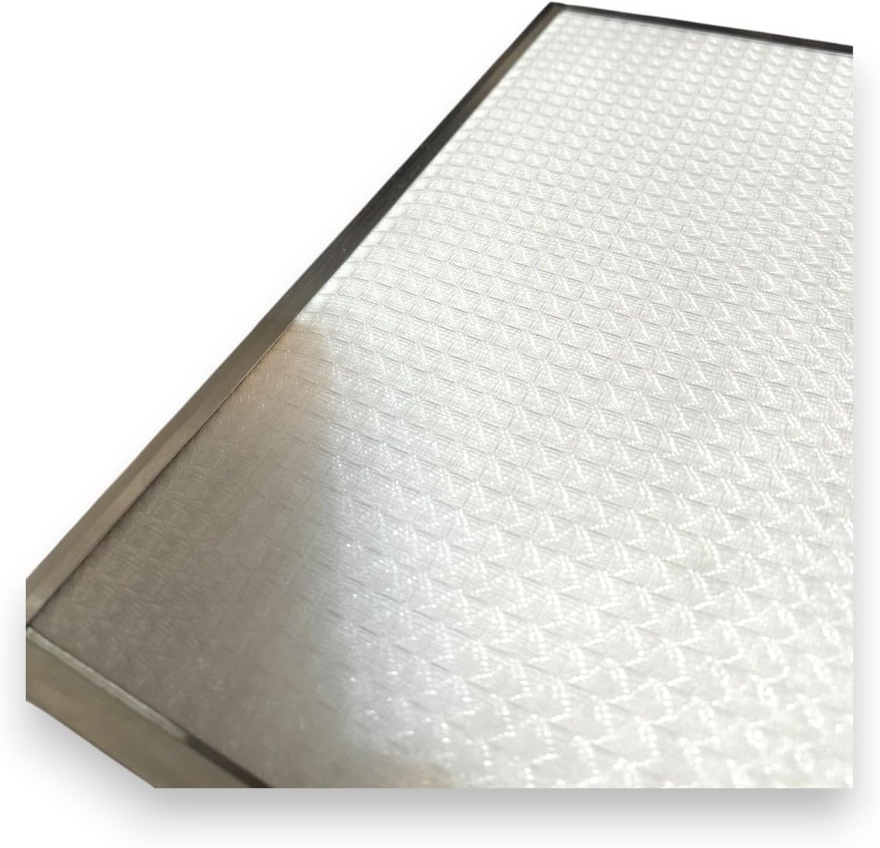 Close-up view of the filter material, showing its fine texture and the metallic frame.