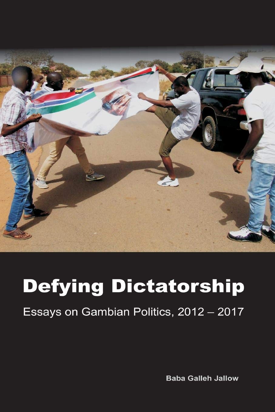 Buy Defying Dictatorship: Essays on Gambian Politics, 2012 - 2017 — BookShops.in