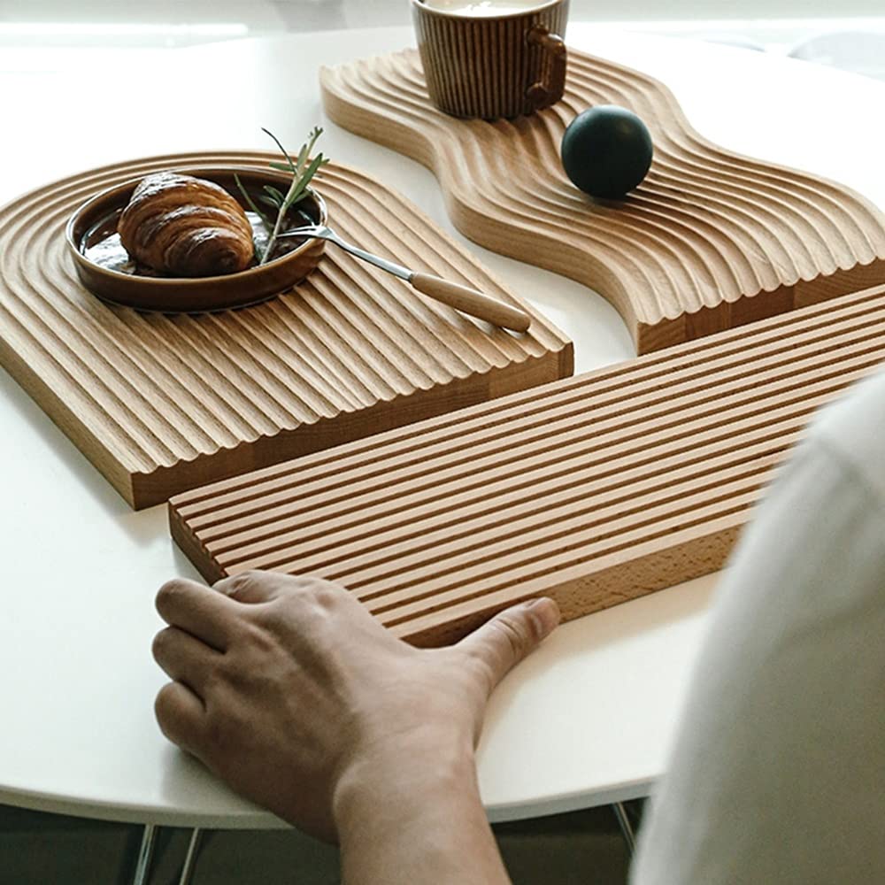 Tagliere per pane ondulato con motivo geometrico creativo
