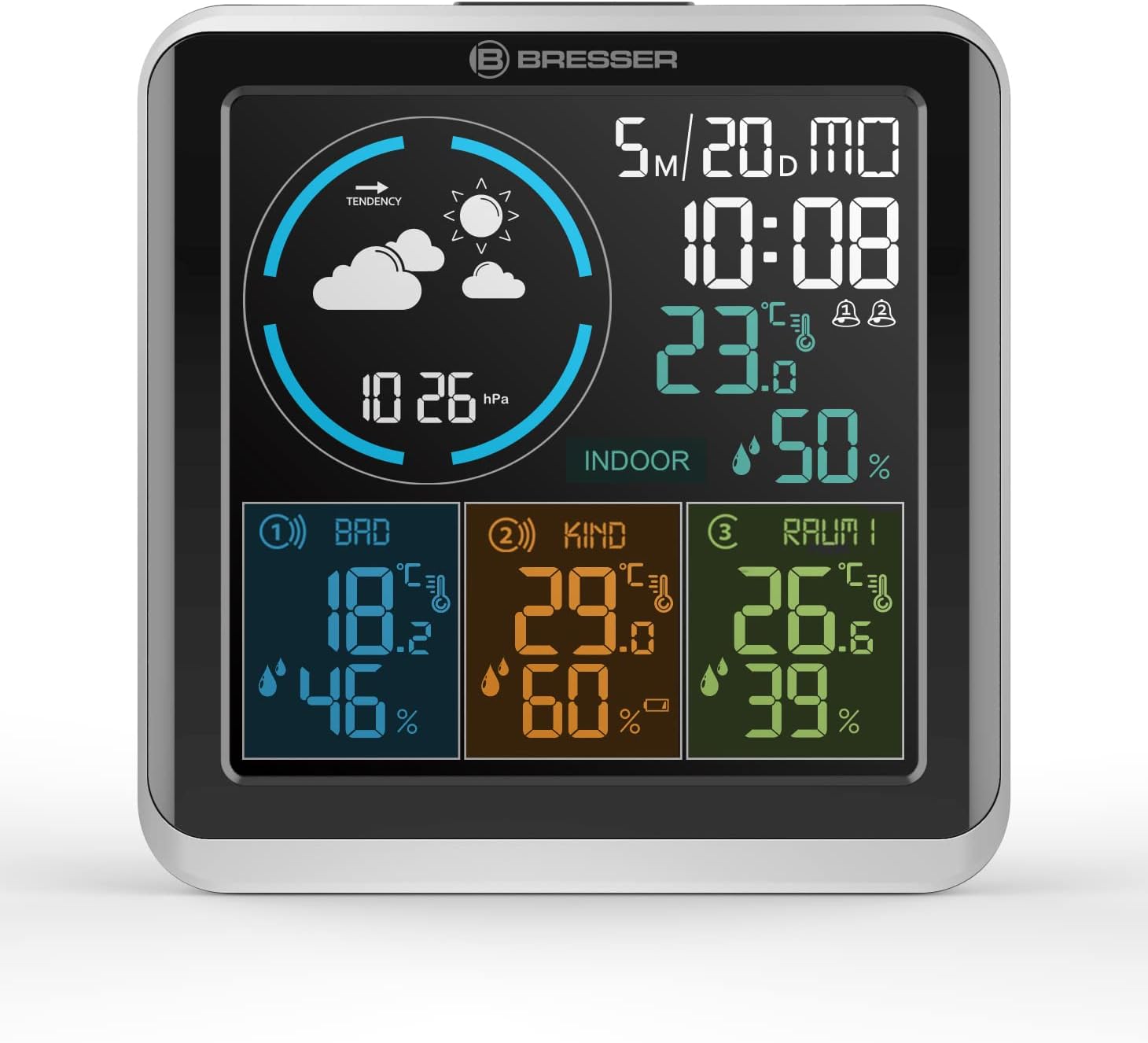 Close-up of the Bresser weather station display showing time, indoor and outdoor temperatures, humidity, and weather forecast icons