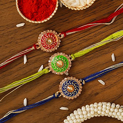 Image of eCraftIndia Red & Golden Set of 3 Trishul with Damru, Lord Ganesha, & Lord Krishna Playing Flute Religious Rakhis with Roli Chawal Pack