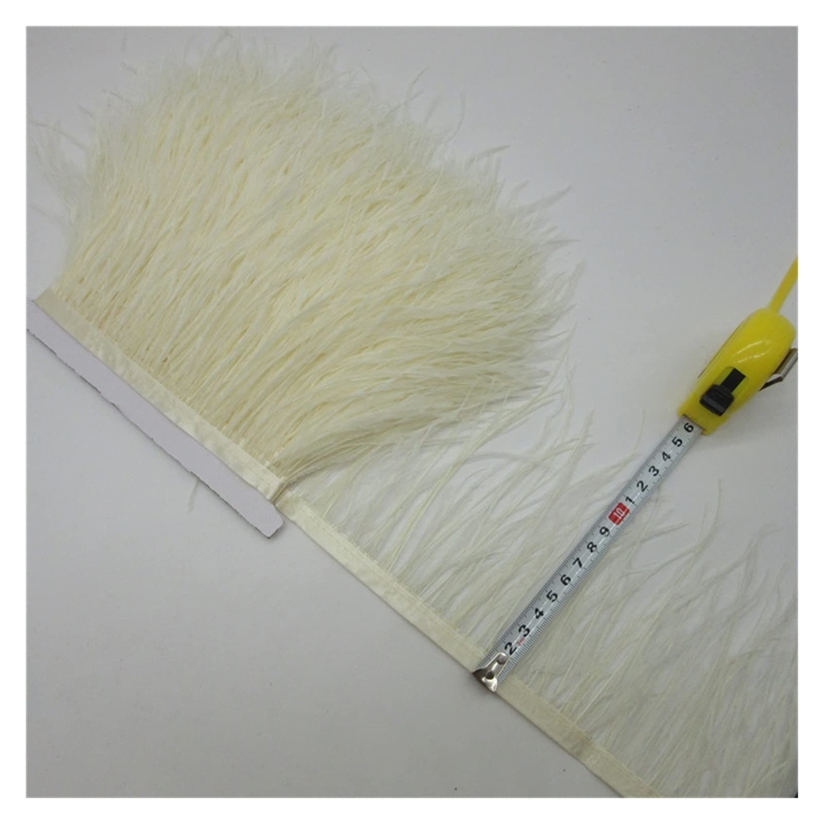 Plumes d'autruche multicolores beige pour réparer un costume