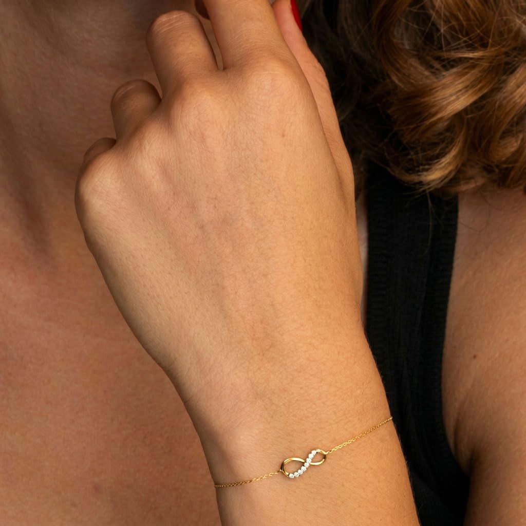 Pulsera de oro amarillo auténtico para mujer – Símbolo de infinito con circonios engarzados