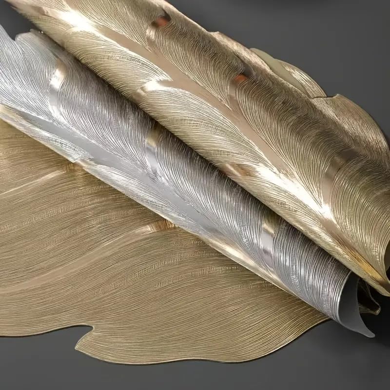 Image of Dakshya Industries Set of 2 PVC Waterproof Leaf Design Table Placemats | Premium Gold Finish Dining Table Mats | Heat Resistant, Washable & Anti-Slip | Decorative Kitchen & Dining Mats (Silver)