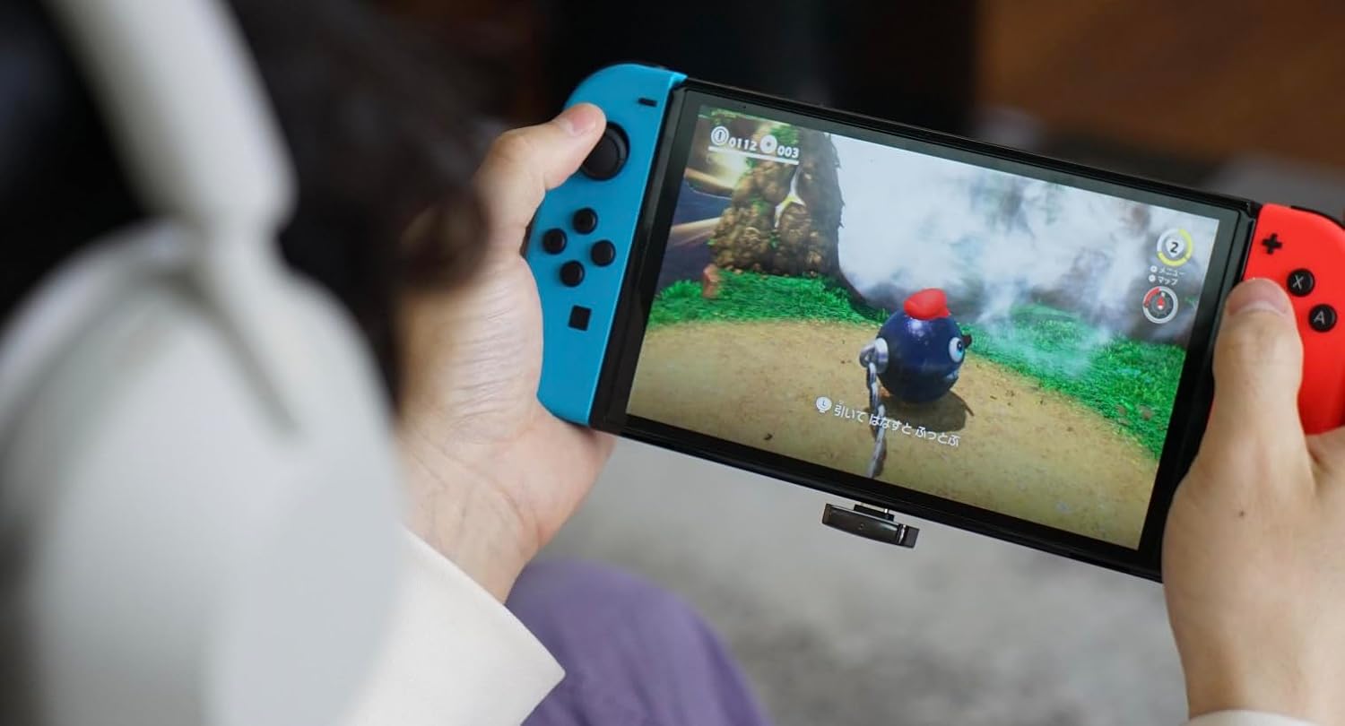 Questyle QCC Dongle Pro connected to a Nintendo Switch