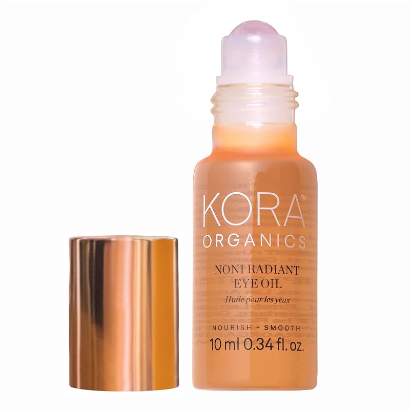 Óleo para a região dos olhos KORA Organics Noni Radiant com aplicador de esfera de quartzo rosa