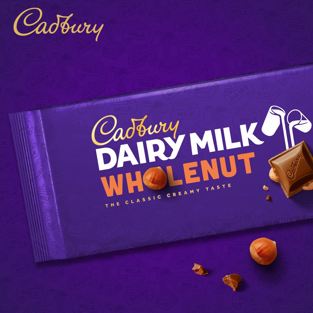 Cadbury Whole Nut, Dairy Milk Schokolade – cremige Milchschokolade mit mit ganzen Haselnuss Stücken – leckere Süßigkeit mit vollmundigem Geschmack – ganze Nuss, 14 x 180 g