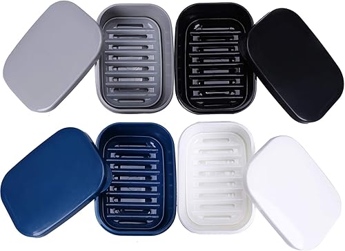 Cuatro recipientes de jabón (negro, blanco, gris)