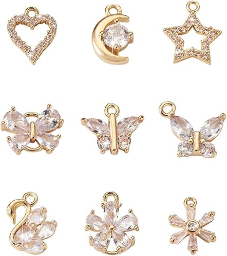 KISSITTY 18 dijes chapados en oro de 14 quilates con forma de estrella y luna, circonita cúbica, mariposa, flor, corazón, para manualidades, aretes,