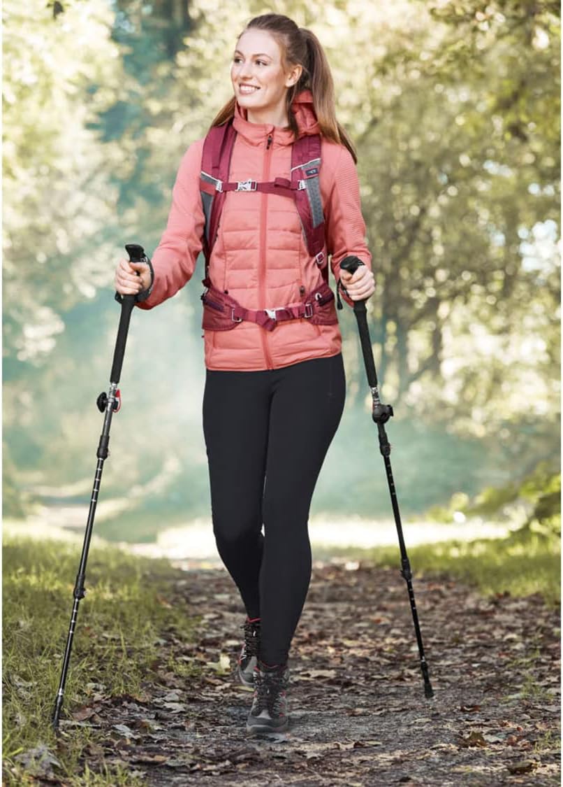 Person using trekking poles on a trail