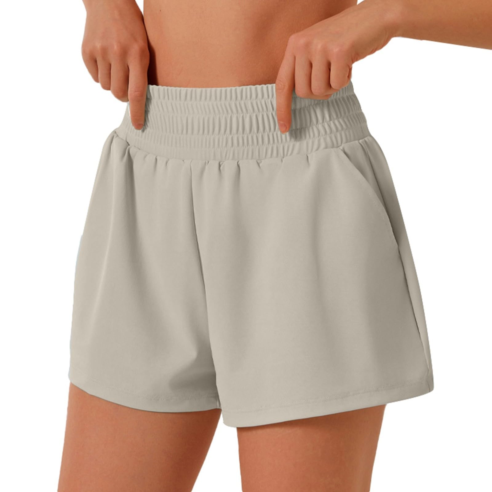 Short running femme ample avec poches pour le running sans gêne