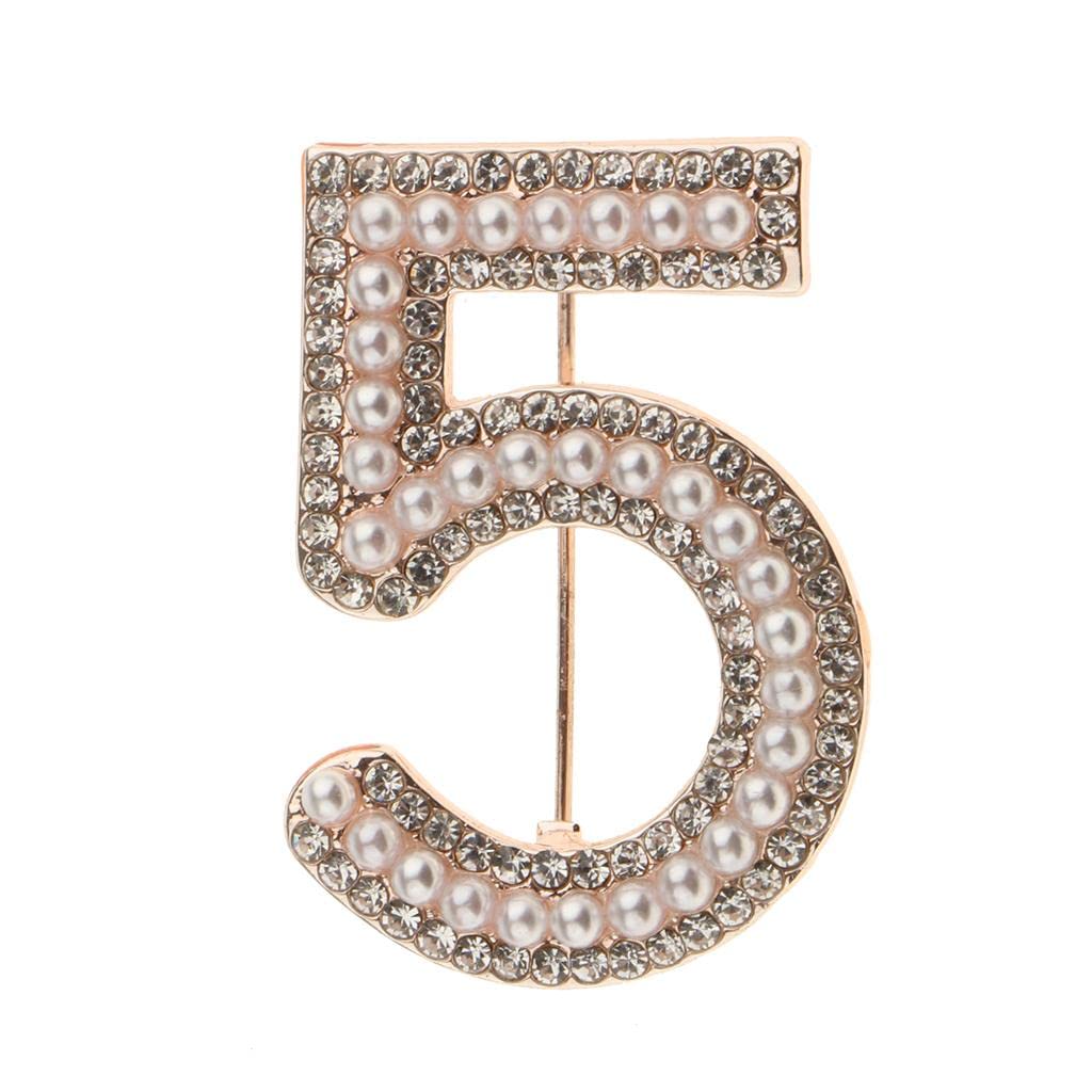 Broche de moda número cinco acabado oro de alta joyería 8