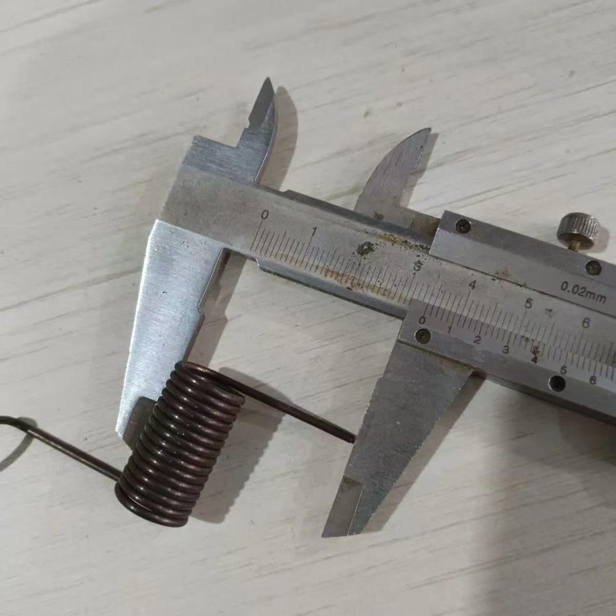 Molle di compressione, Molla della seminatrice a becco d'anatra