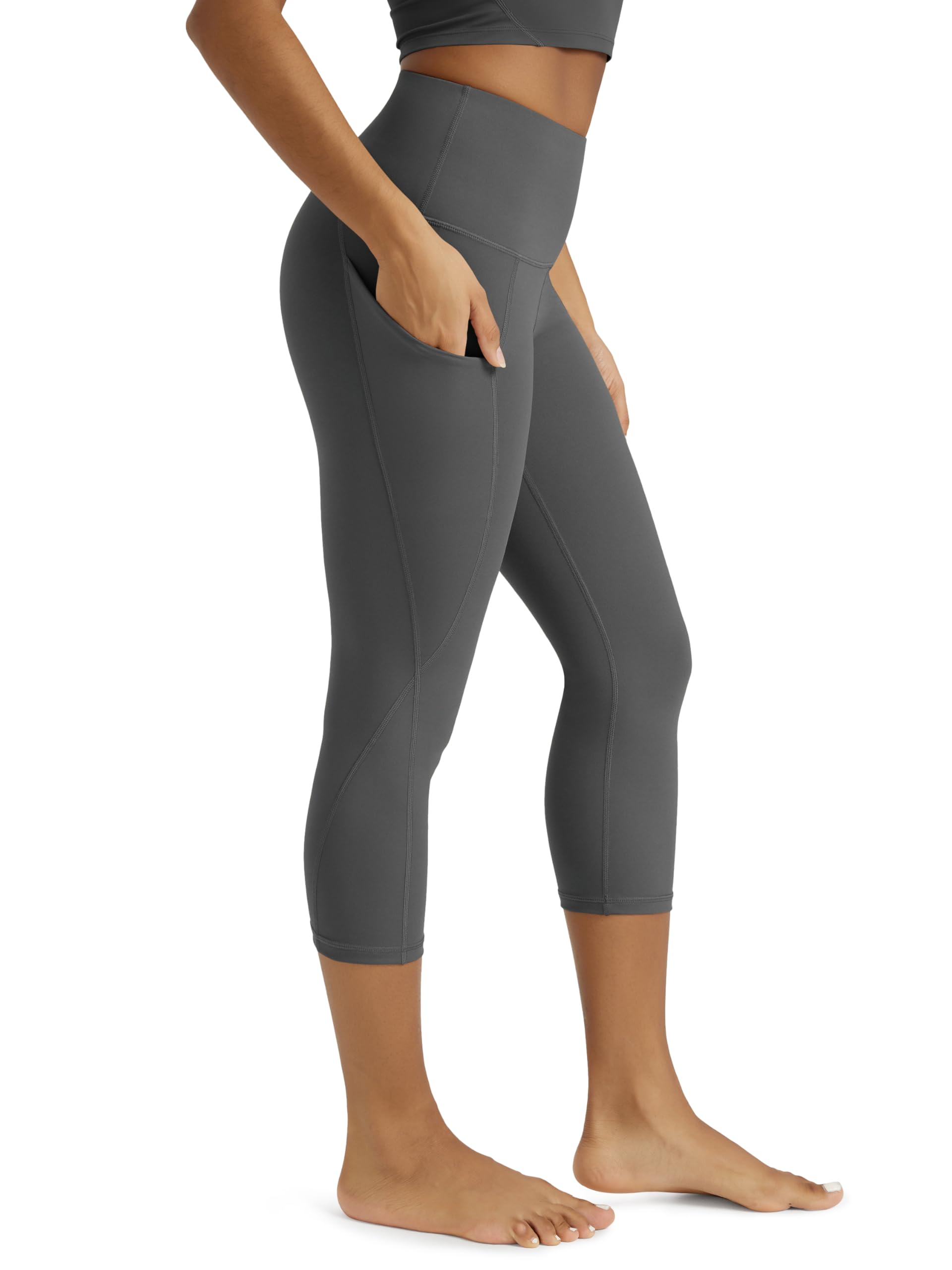 ODODOS Women's High Waisted Yoga Capris with Pockets, Tummy Control Non See Through Workout Athletic Running Capri Leggings