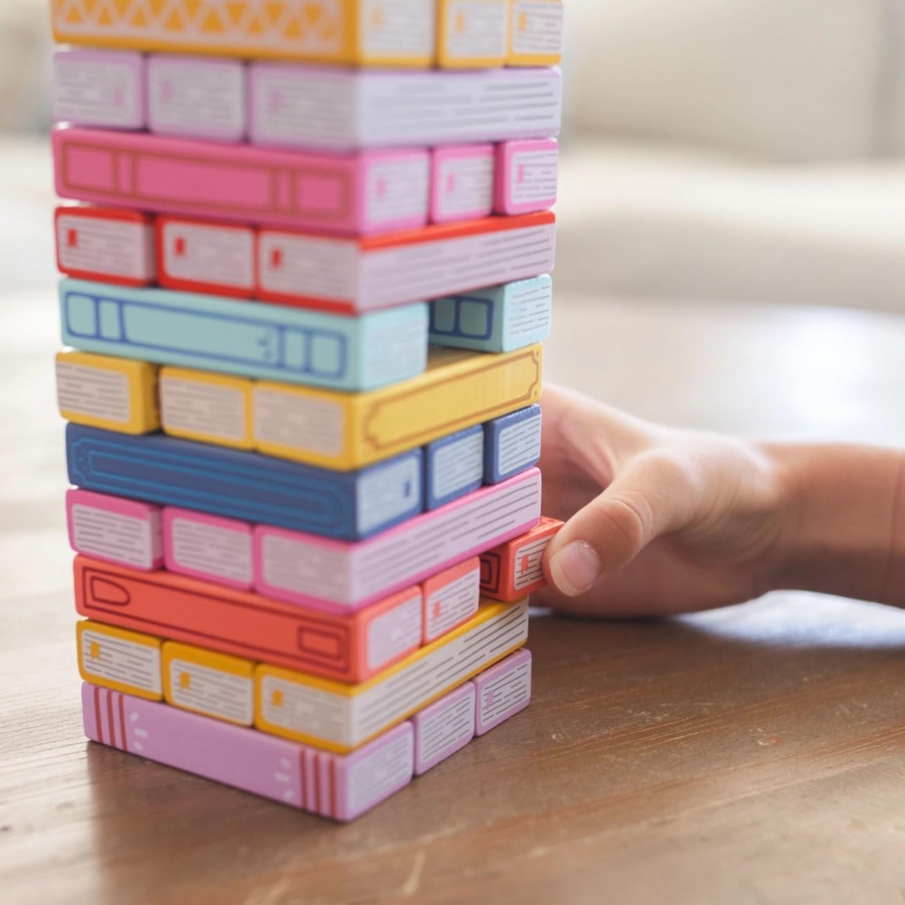 Pippi Post Tumbling Book Stack Game, Wooden Blocks with Colorful Spine Design, 51 Pieces, Classic Stacking Tower Game for Bibliophiles