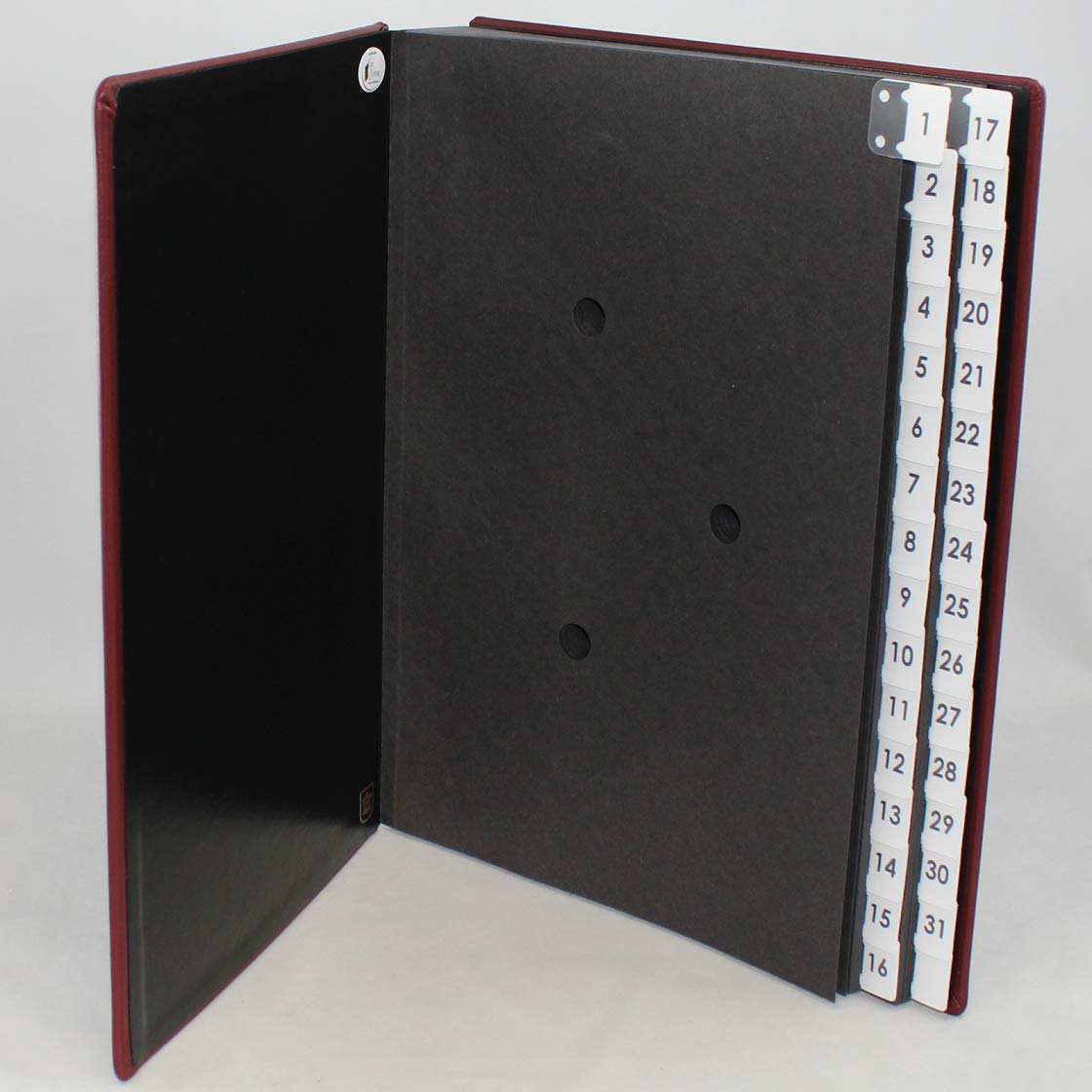 Carpeta clasificadora con registro 1-31 de piel de vacuno lisa en color rojo vino