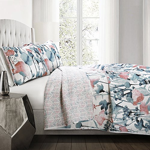 Evite un dormitorio apagado con el juego de ropa de cama reversible de flores azul 3