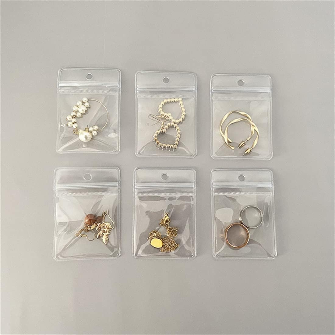 100pcs Clear PVC Transparent Zipper Jewelry Bag with Hang Hole Plastic Small Size Dust Proof Airtight Pouch Zipper Bag Self Seal Packing Pouch Organizer Storage Bags for Rings Earrings