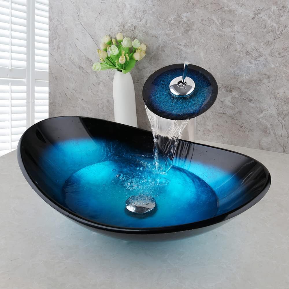Oval Blue Glass Vessel Sink 22x14 Inch with Waterfall Faucet and Pop-Up Drain Tempered Glass Basin Top Mount Bathroom Sinks Boat Shape Design Bowl for Apartment Bathrooms Vanities