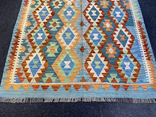 Tapis afghan kilim réversible pour sublimer un sol moderne - 6