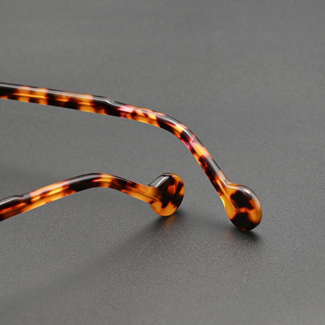 Occhiali da sole rotondi in acetato, montatura alla moda vintage.