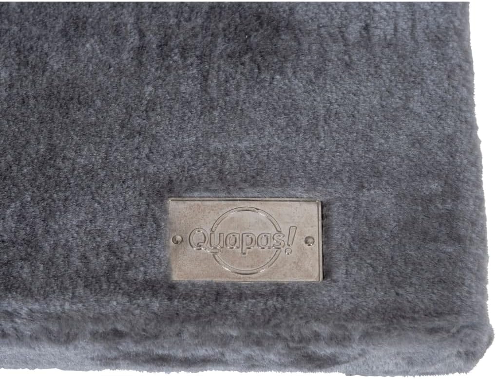 Close-up of Quapas! brand tag on plush material