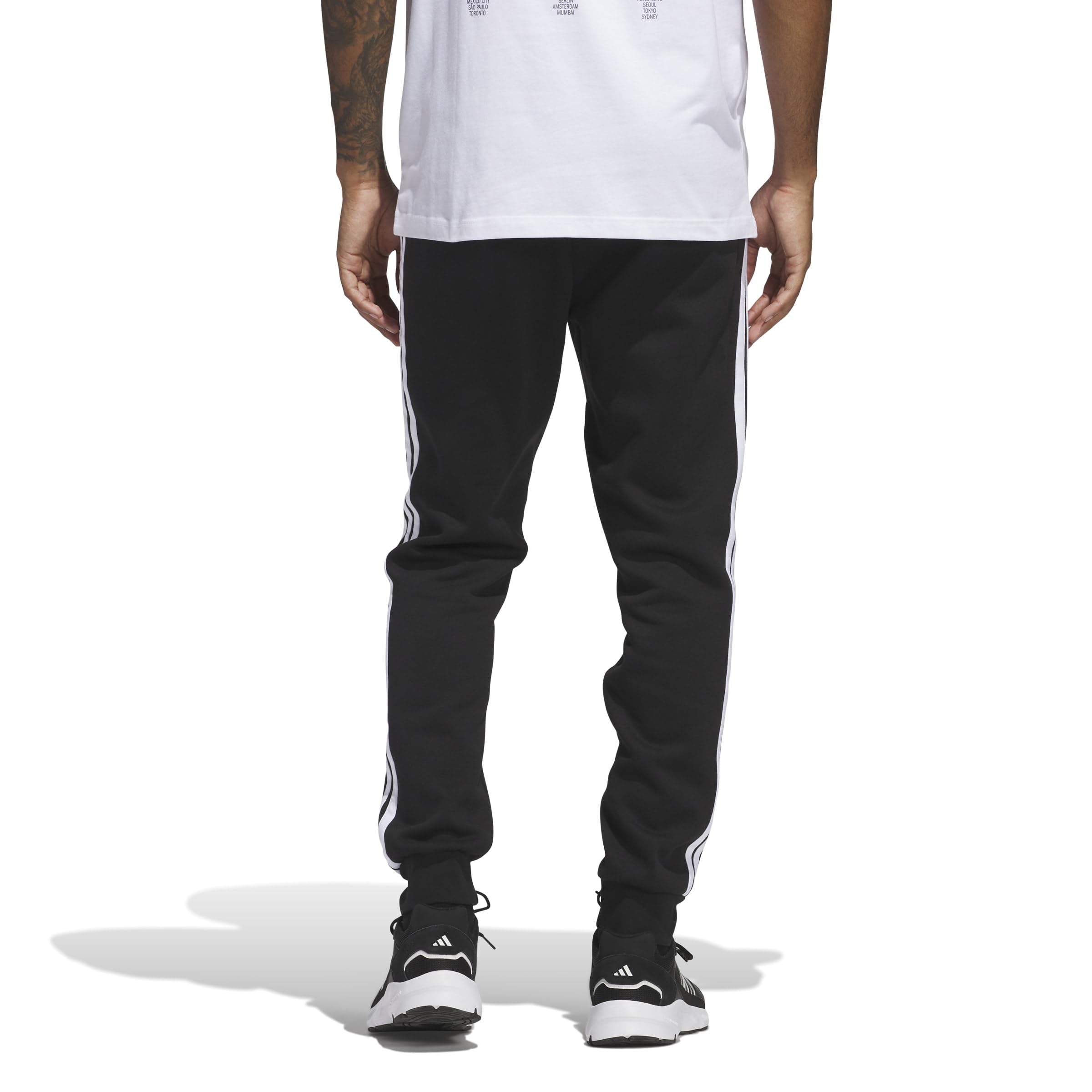 adidas ESSENTIAL THREE STRIPES FLEECE PANT - Spodnie golfowe Mężczyźni