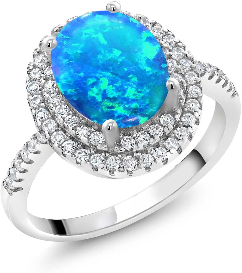 Gem Stone King 925 Sterling Silver Halo Engagement Ring Oval Cabochon Blue Simulated Opal and Moissanite (0.99 Cttw)