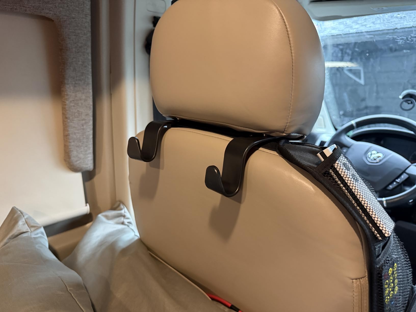 Car Headrest Hooks hanging bags and items behind front seats