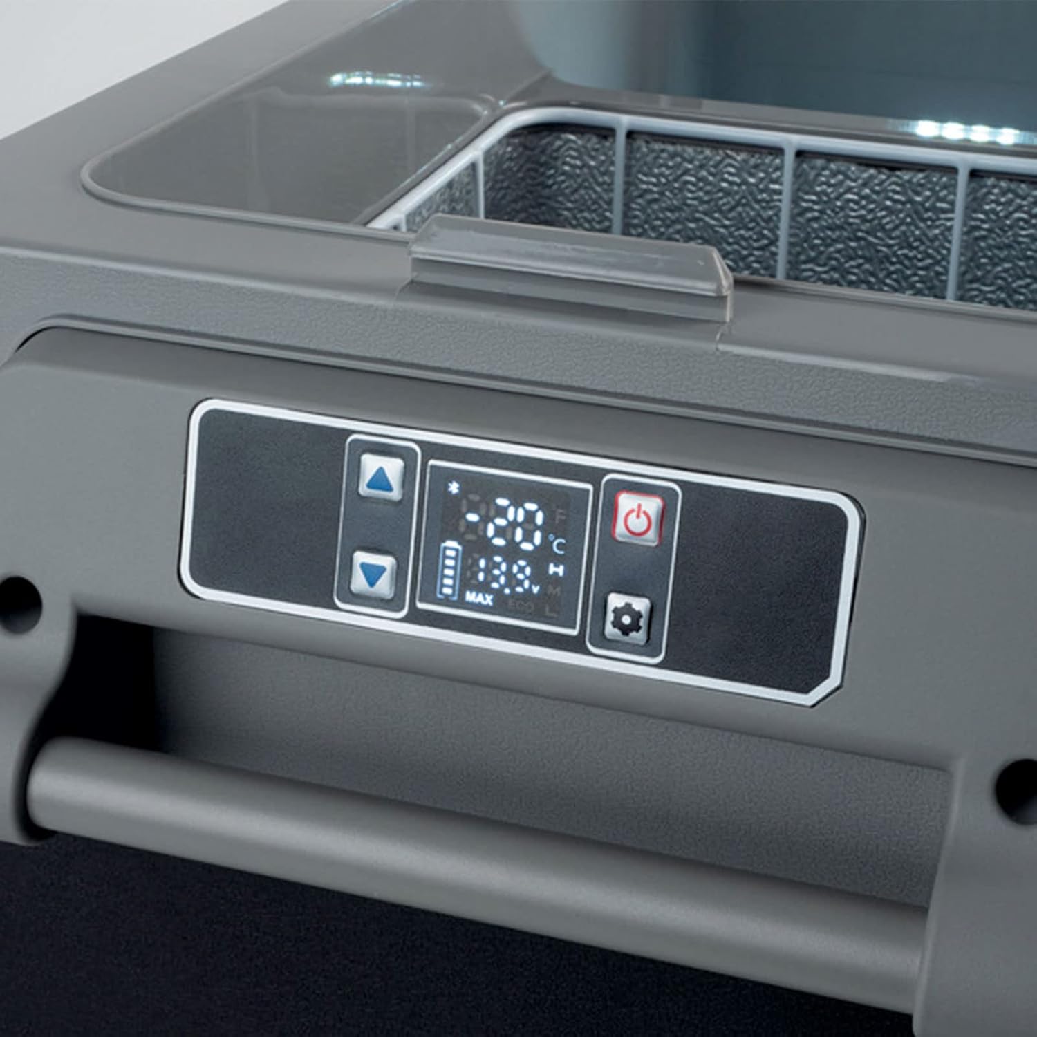 Close-up of the Carbest portable refrigerator/freezer control panel with digital display, power button, temperature adjustment buttons, and settings button.