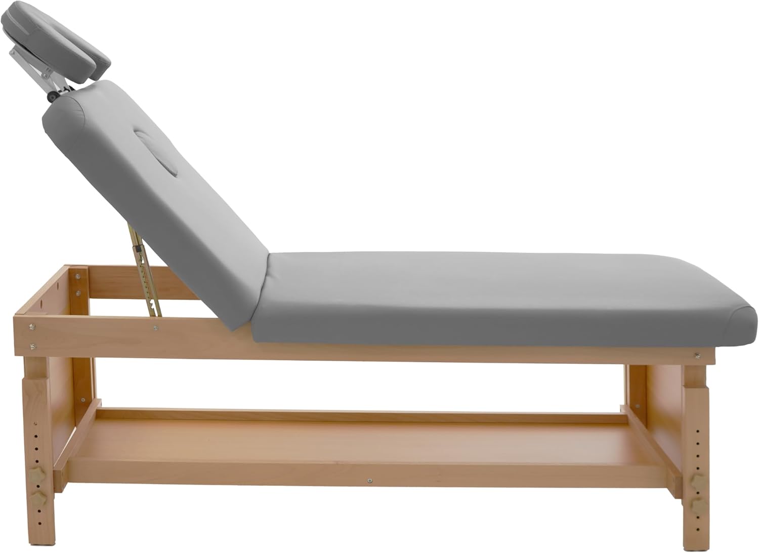 Lato view of the massage bed with one leg section being attached to the main frame.