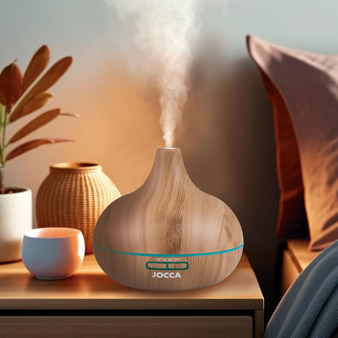 Jocca Essential Oil Diffuser emitting mist in a bedroom setting