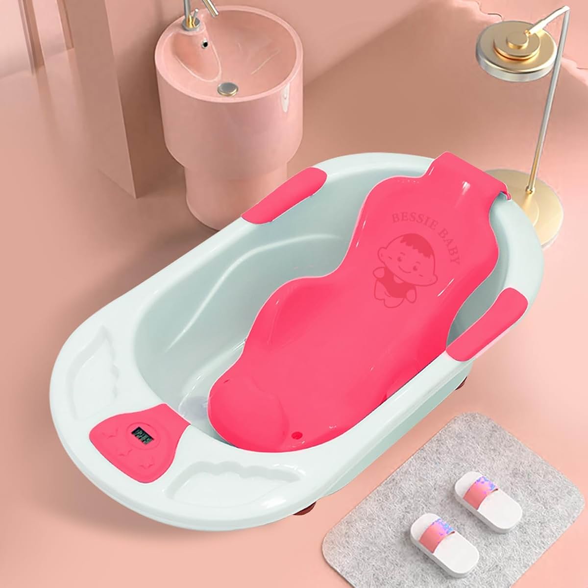 White and pink baby bath tub with detachable bather and temperature sensor