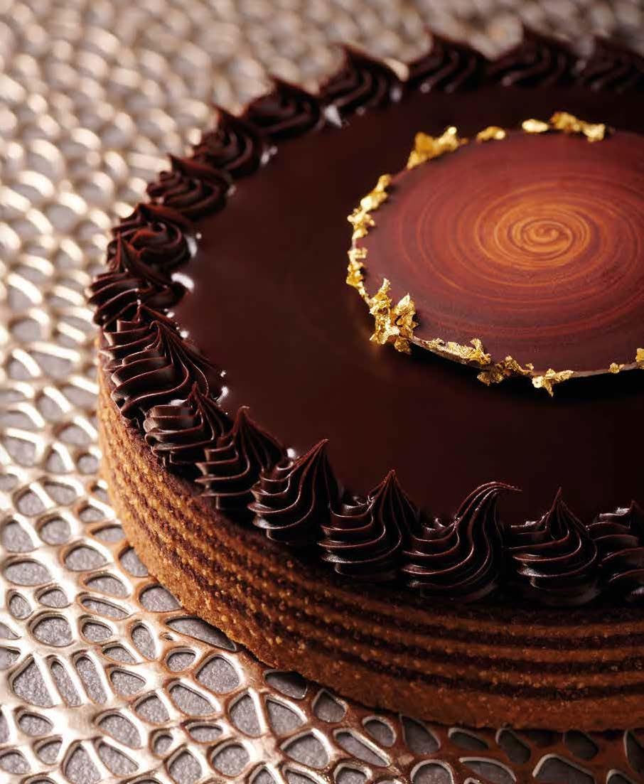 Al cioccolato. Viaggio tra dolci da forno, torte moderne, biscotti e mignon in 50 irresistibili ricette