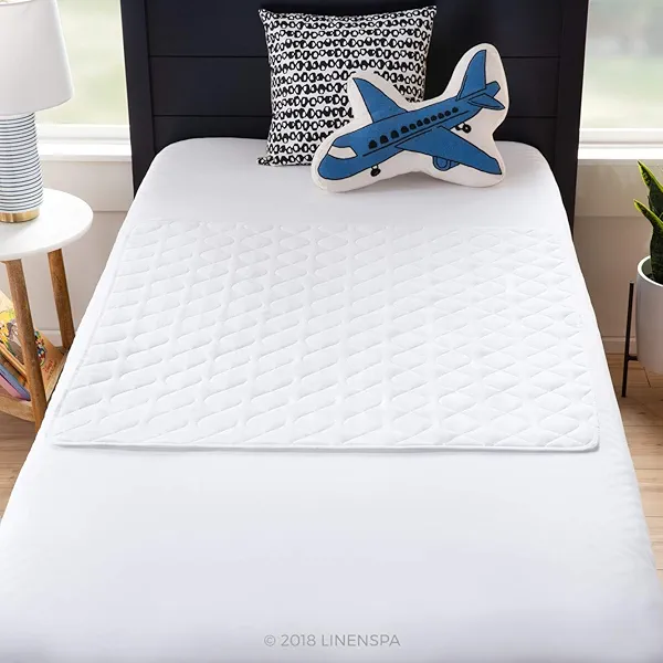 LINENSPA Waterproof Mattress Pad | 34" x 36" Non Slip Waterproof Sheet and Mattress Protector | Highly Absorbent, Machine Washable, Quilted | Single Sleeper / Twin size, White