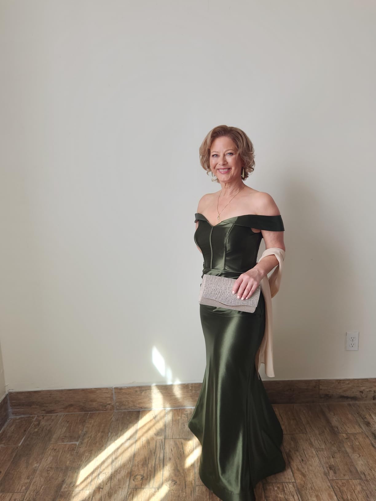 Elegant gold clutch styled for an evening event