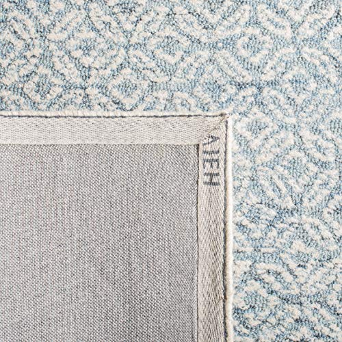 Tapete decorativo rectangular 2' x 3' azul y marfil miniatura 1