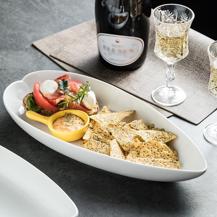 モダンな大型ディナープレート 12インチの純白のセラミックオーバルプレート家庭用シンプルな前菜サラダリーフ特別な形のホテル 積み重ね