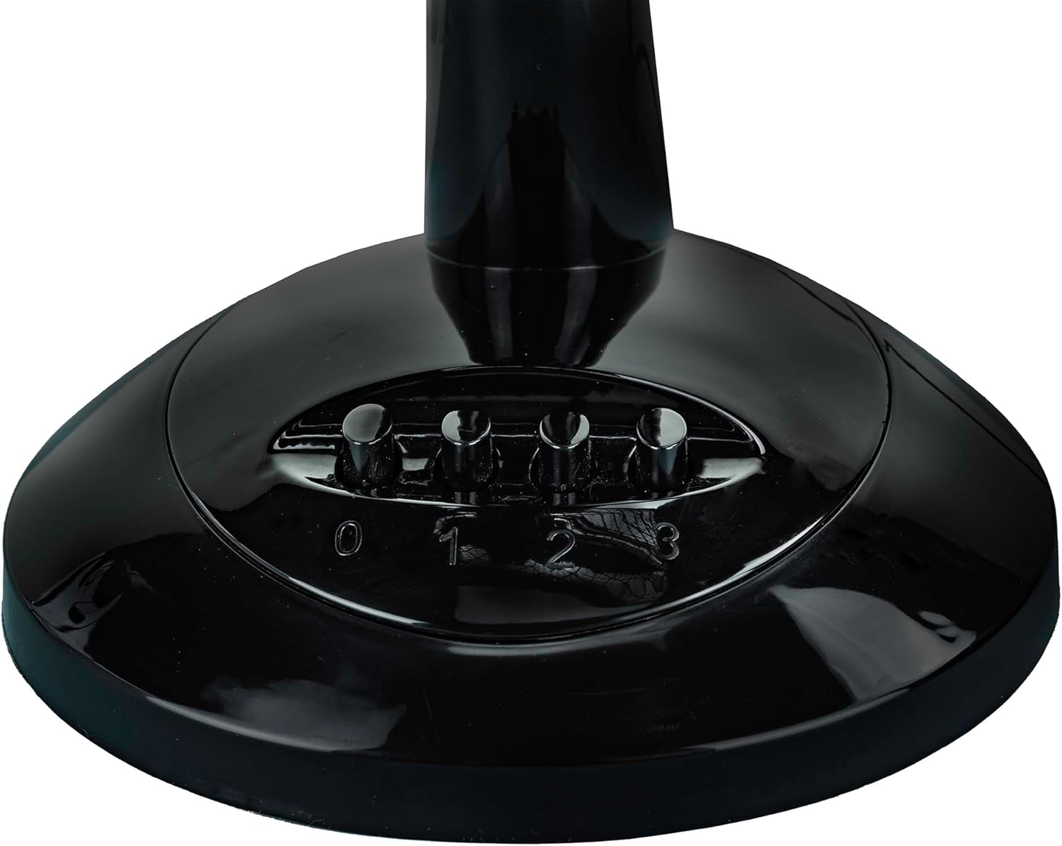 Close-up of speed control buttons on fan base