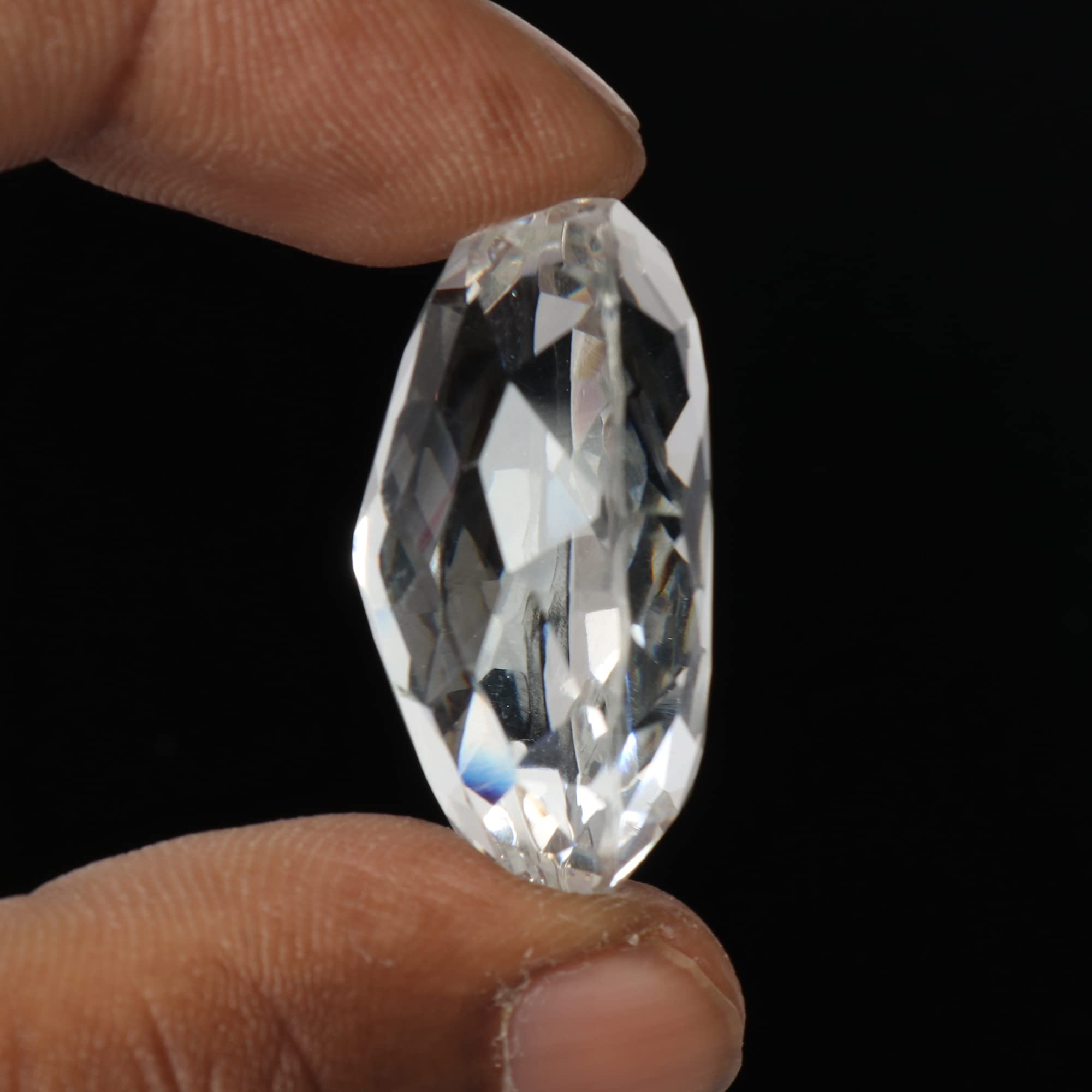 Topaze blanche ronde a facettes 5 mm 0.59 carat – Pierres Du Monde