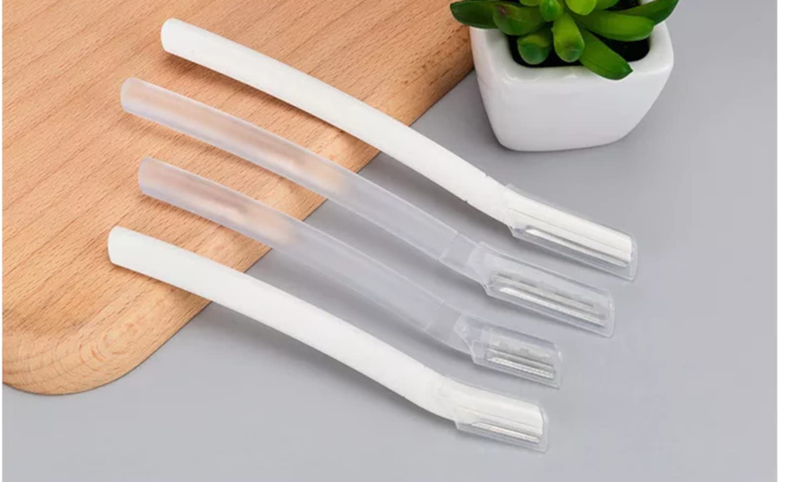 EWANTO 20x Augenbrauenrasierermesser 4er Gesicht Rasiermesser Rasierklingen Beauty Eyebrow Shaper Weiß und transparent (20x Set)