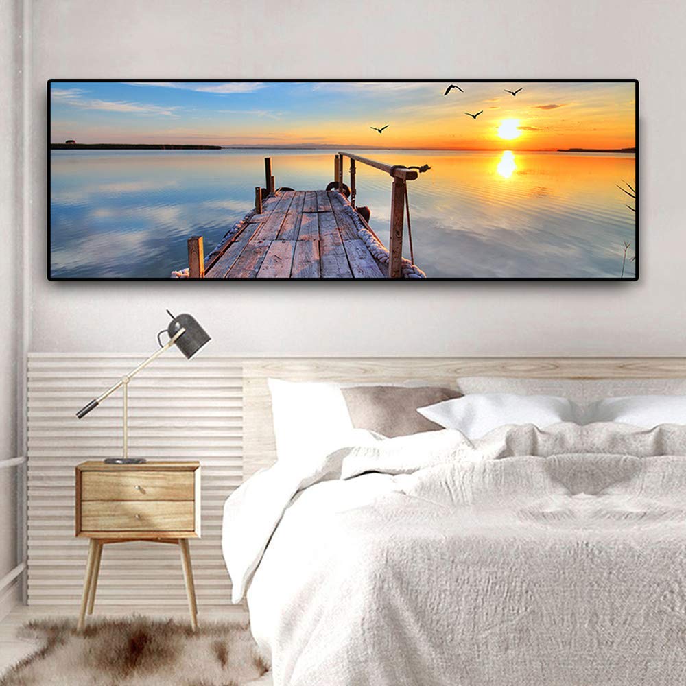 Toile coucher de soleil et pont en bois pour créer un salon cocooning