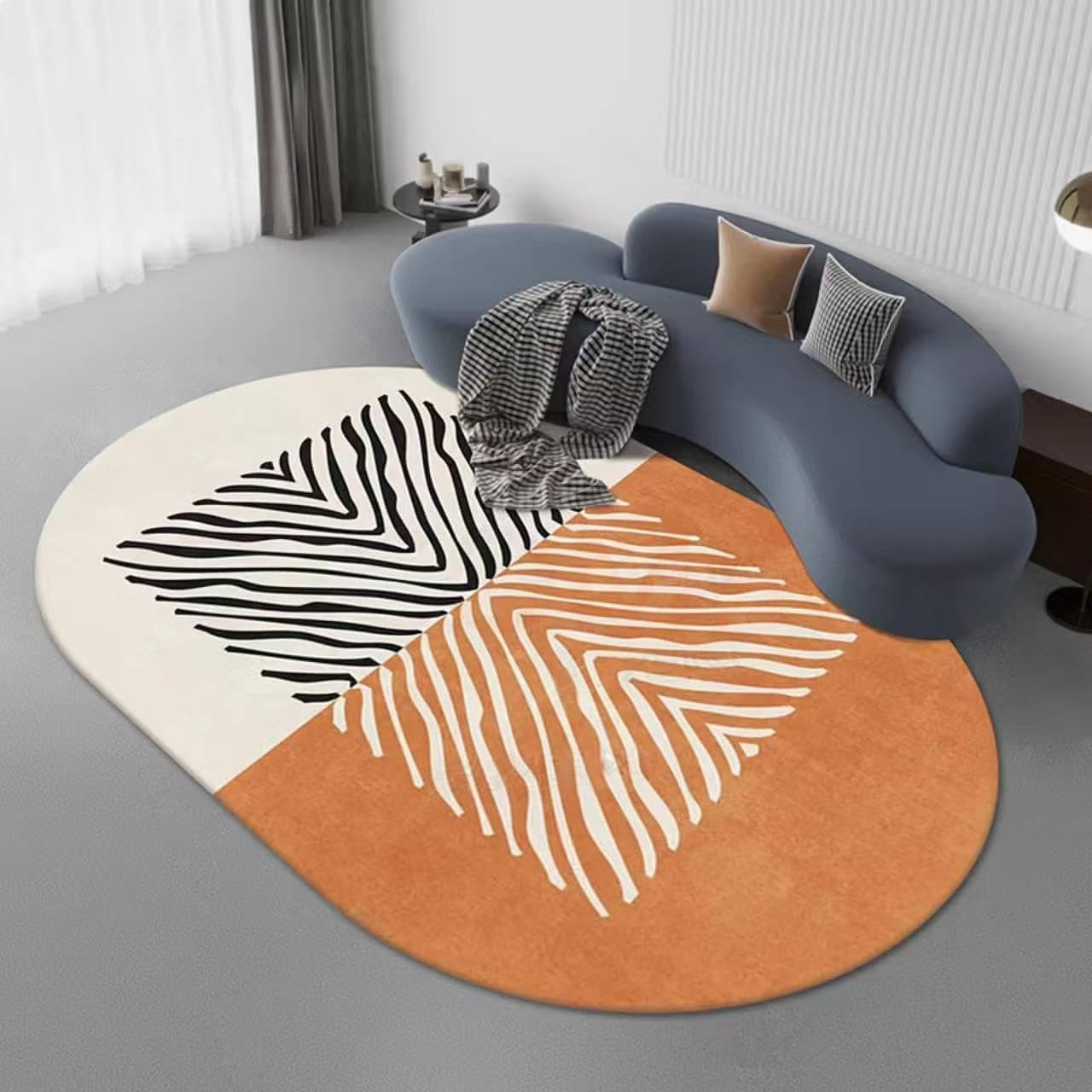 Alfombra ovalada de diseño minimalista moderno en colores crema y naranja de 80x140cm 1