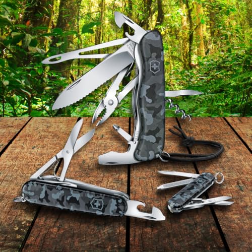 Image of Victorinox Huntsman Swiss Army Knife, 15 Functions, Swiss Made Pocket Knife with Large Blade, Screwdriver, Scissors and Wood Saw - Navy Camouflage