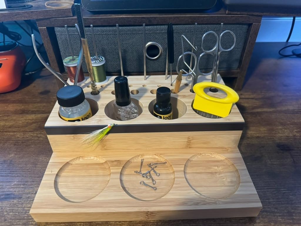 Raprance wooden fly tying caddy with 33 compartments on a bench